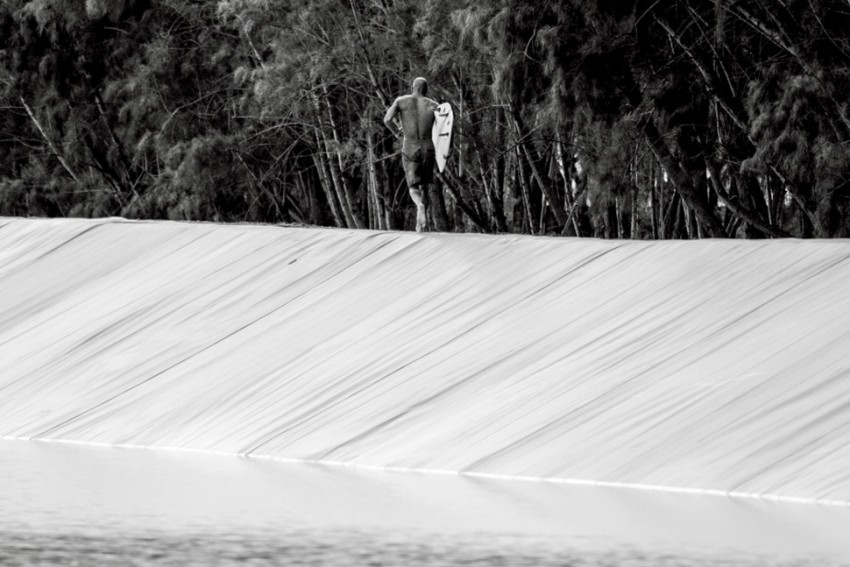 Slater first to ride his manmade wave in board shorts | Surf Park Central