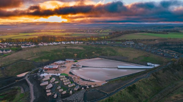 Lost Shore Surf Resort, a surf park in Scotland, as the sun rises.