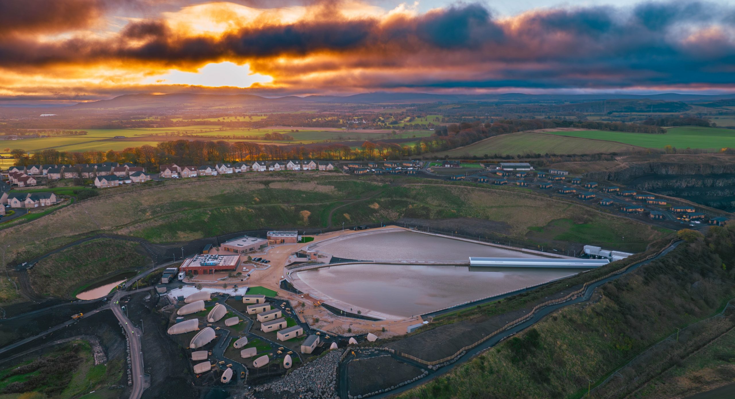 Lost Shore Surf Resort, a surf park in Scotland, as the sun rises.