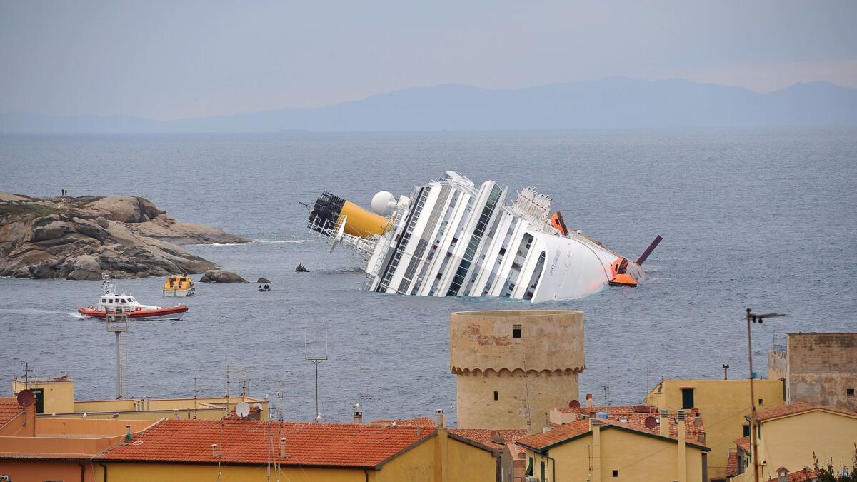 Captain who commanded Costa Concordia in cruise disaster that killed 32  begins 16-year prison sentence - Los Angeles Times