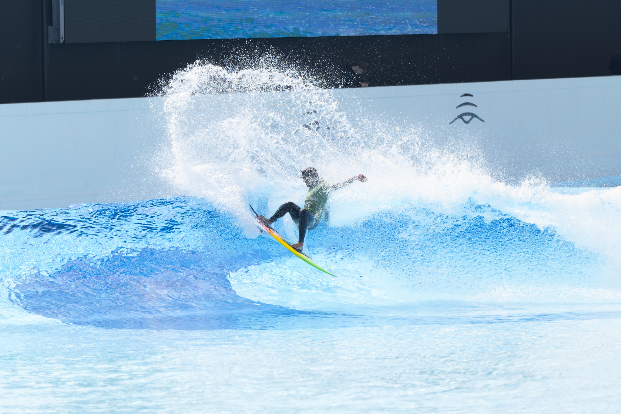 A surfer in a wave pool