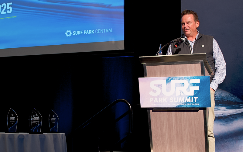 Jess Ponting from Surf Park Central stands at a podium.